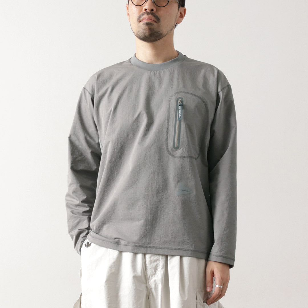 AND WANDER / Hybrid Warm Pocket Long Sleeve T-Shirt