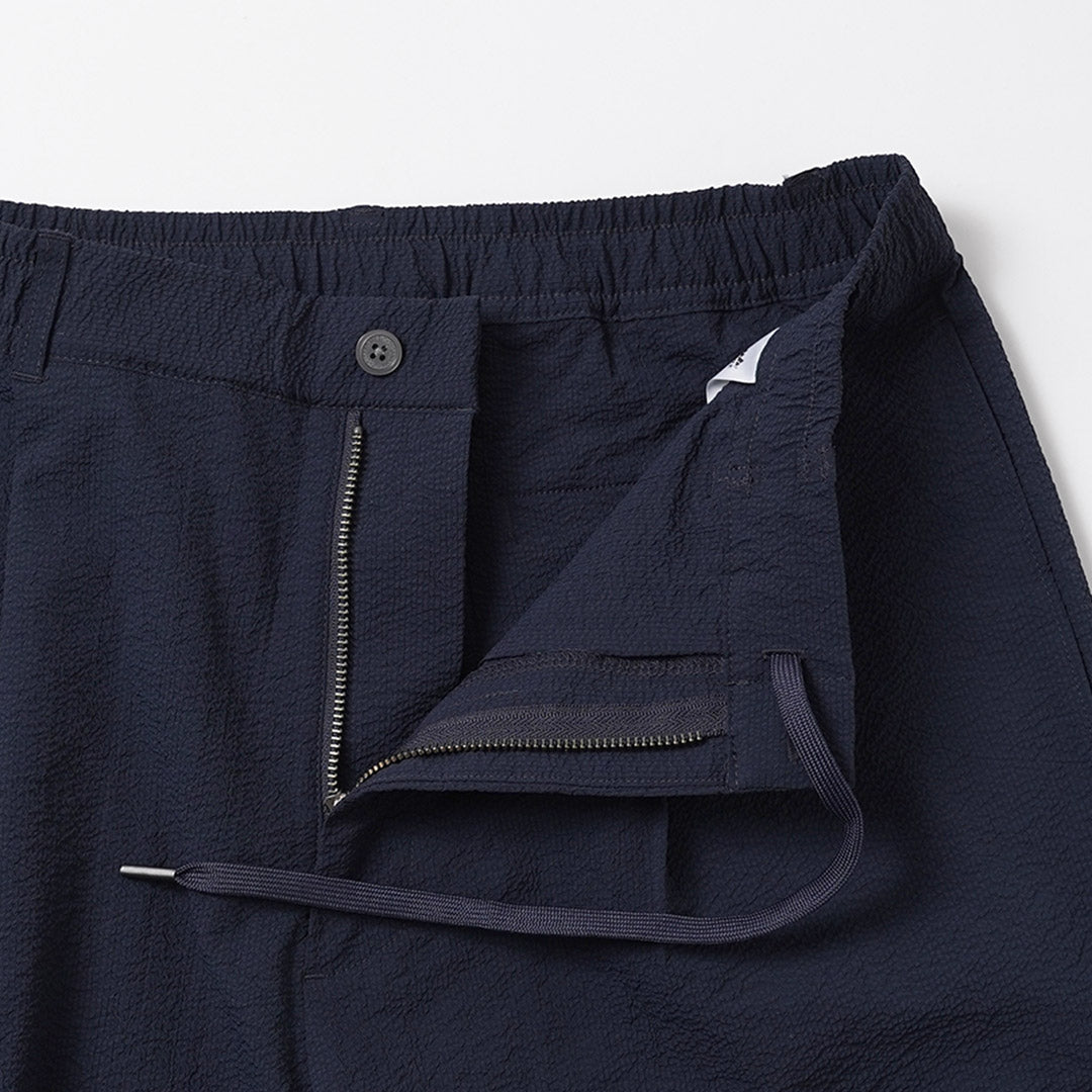THOUSAND MILE / Pantalón Easy Tuck de sirsaca