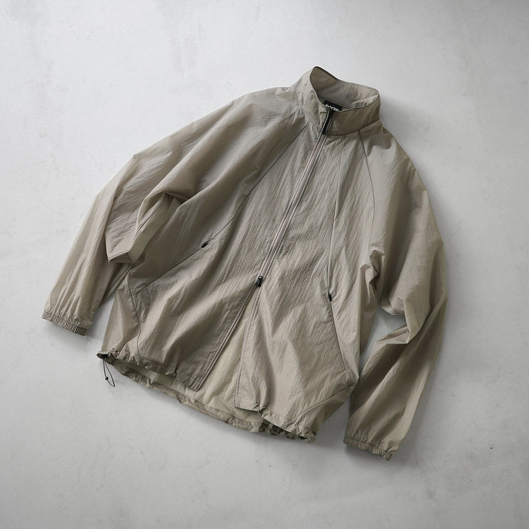 GOLDWIN / Veste coupe-vent en nylon transparent