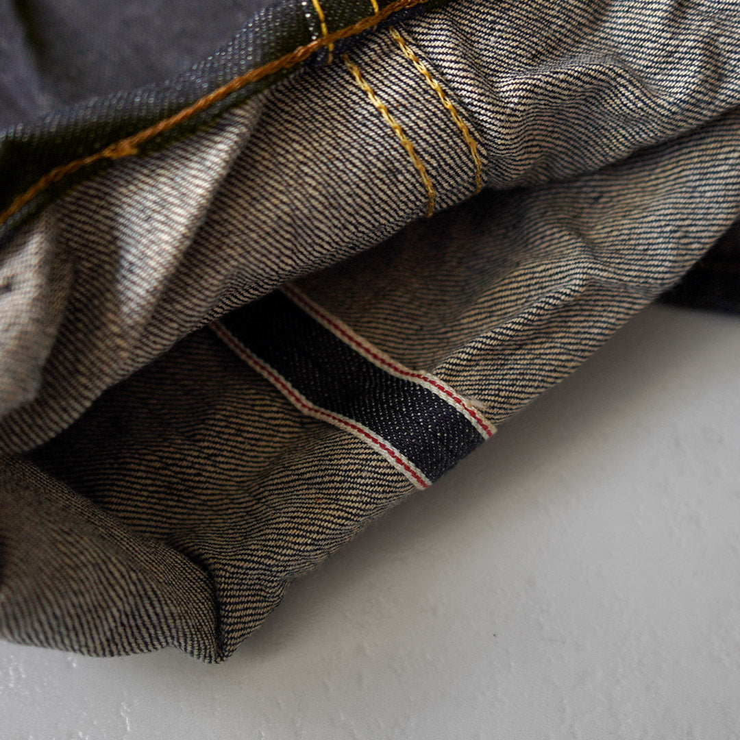 SKEWED / Pantalon avec poche à monnaie Jean en denim