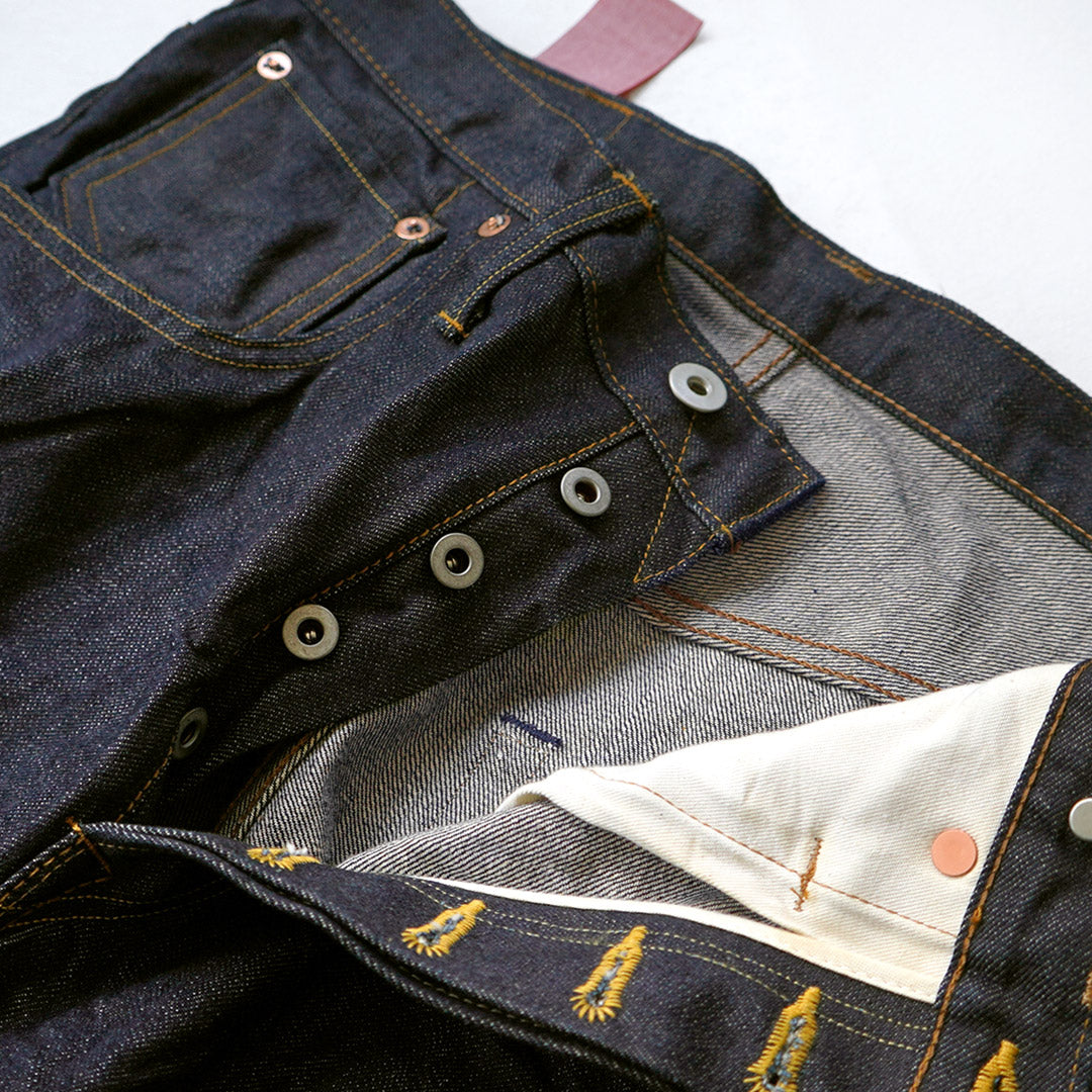 SKEWED / Pantalon avec poche à monnaie Jean en denim