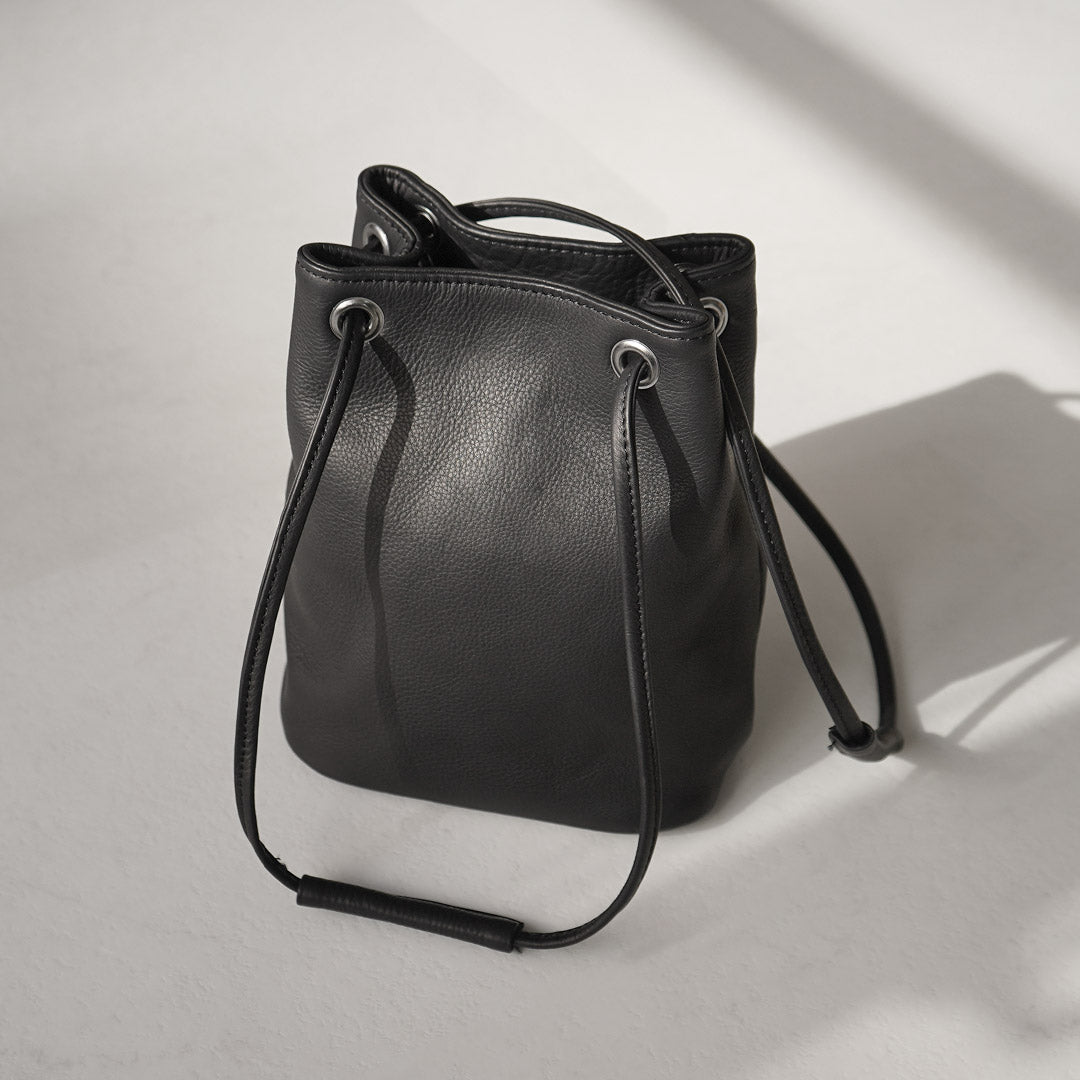 MR.OLIVE / 防渗透皮革 2 路小圆筒包