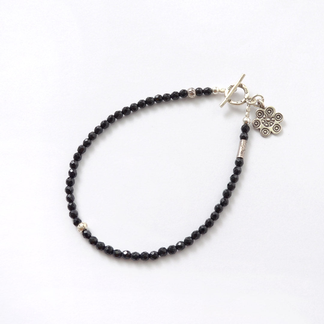 PHADUA / Black onyx cut beads bracelet