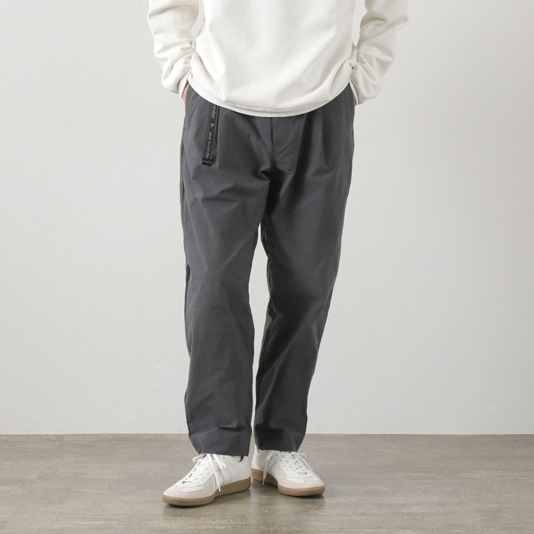 AND WANDER / Nylon Chino Tucked Tapered Pants