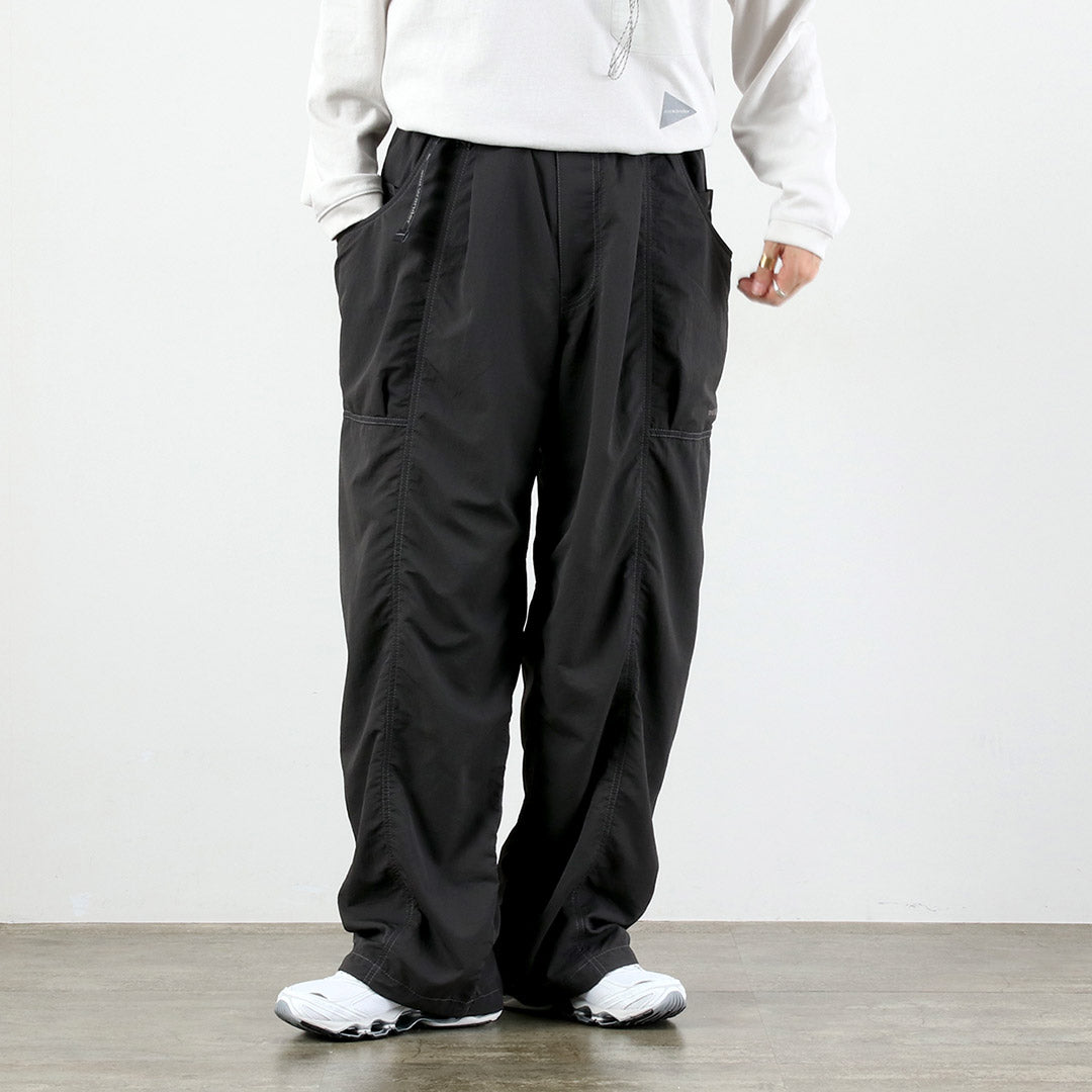 AND WANDER / Crinkle Nylon Pants