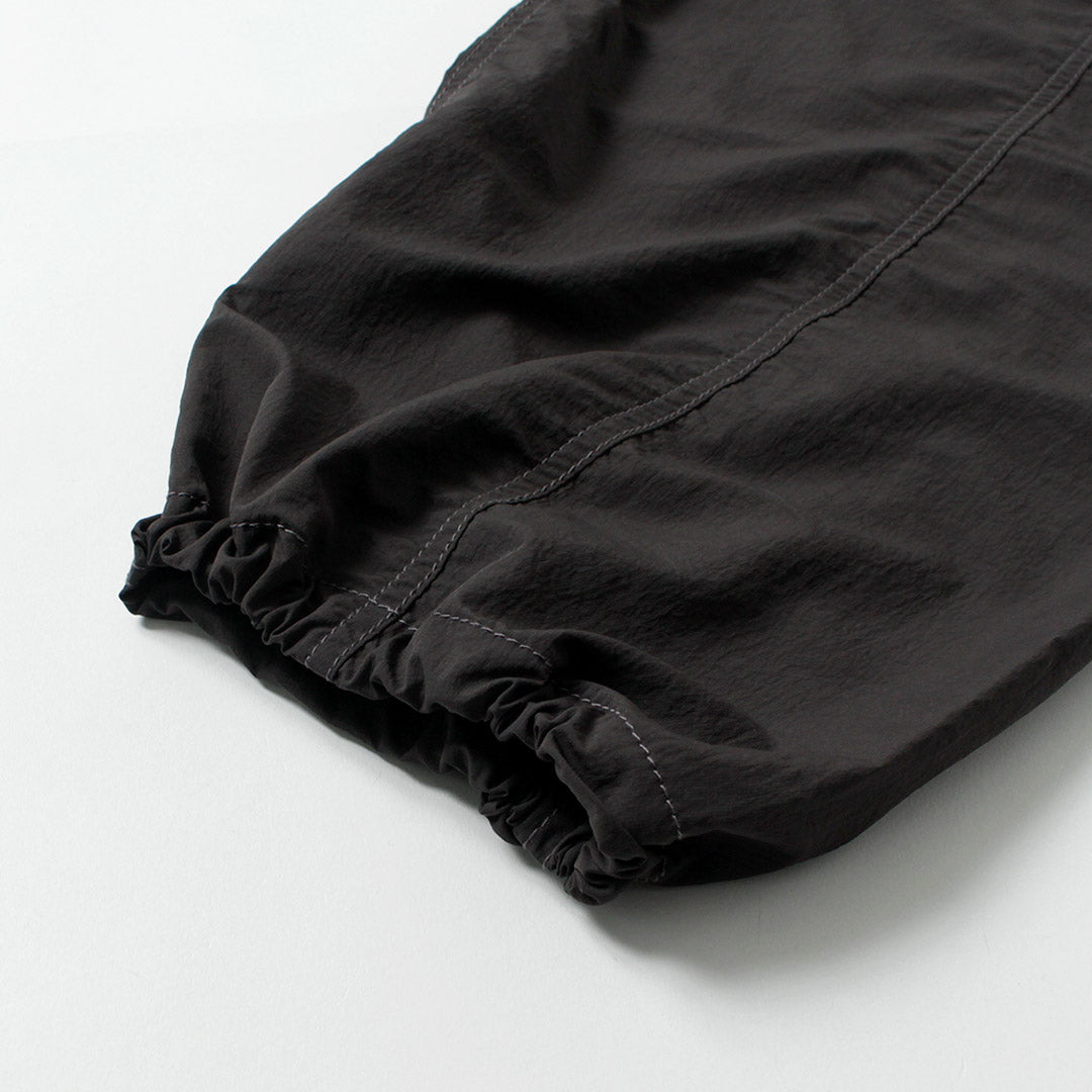 AND WANDER / Crinkle Nylon Pants