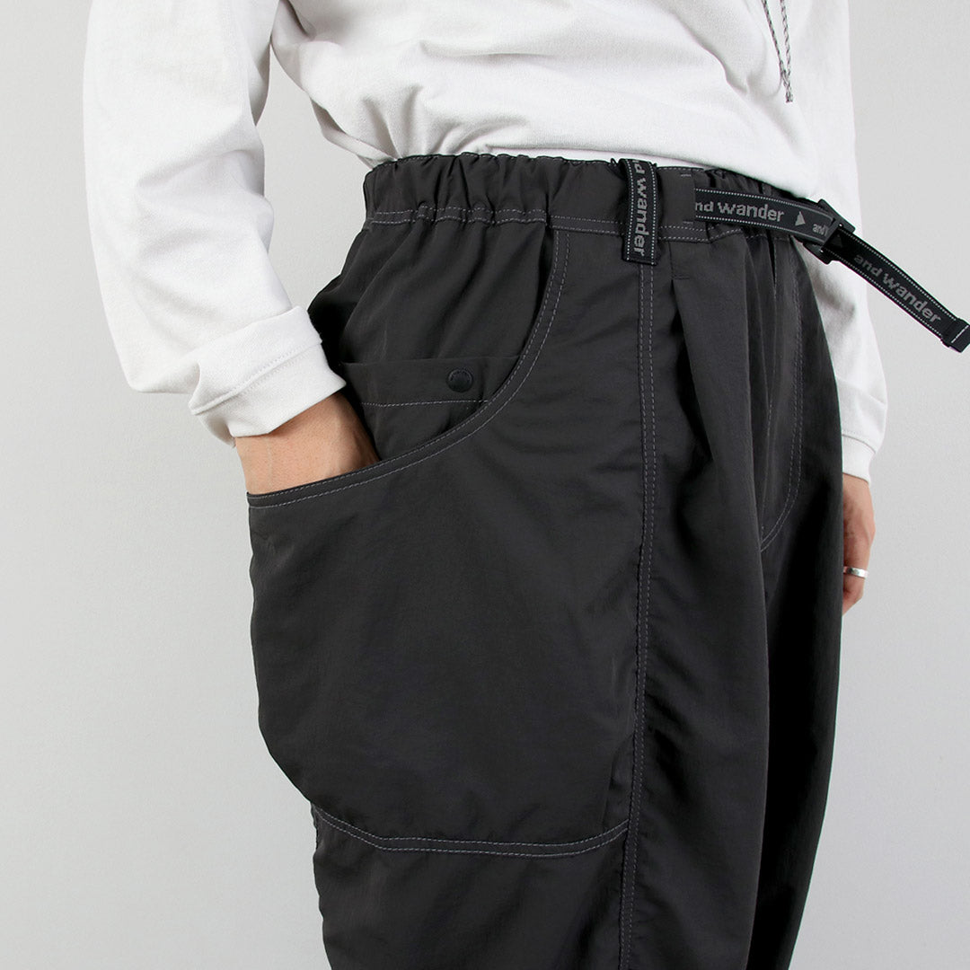 AND WANDER / Crinkle Nylon Pants