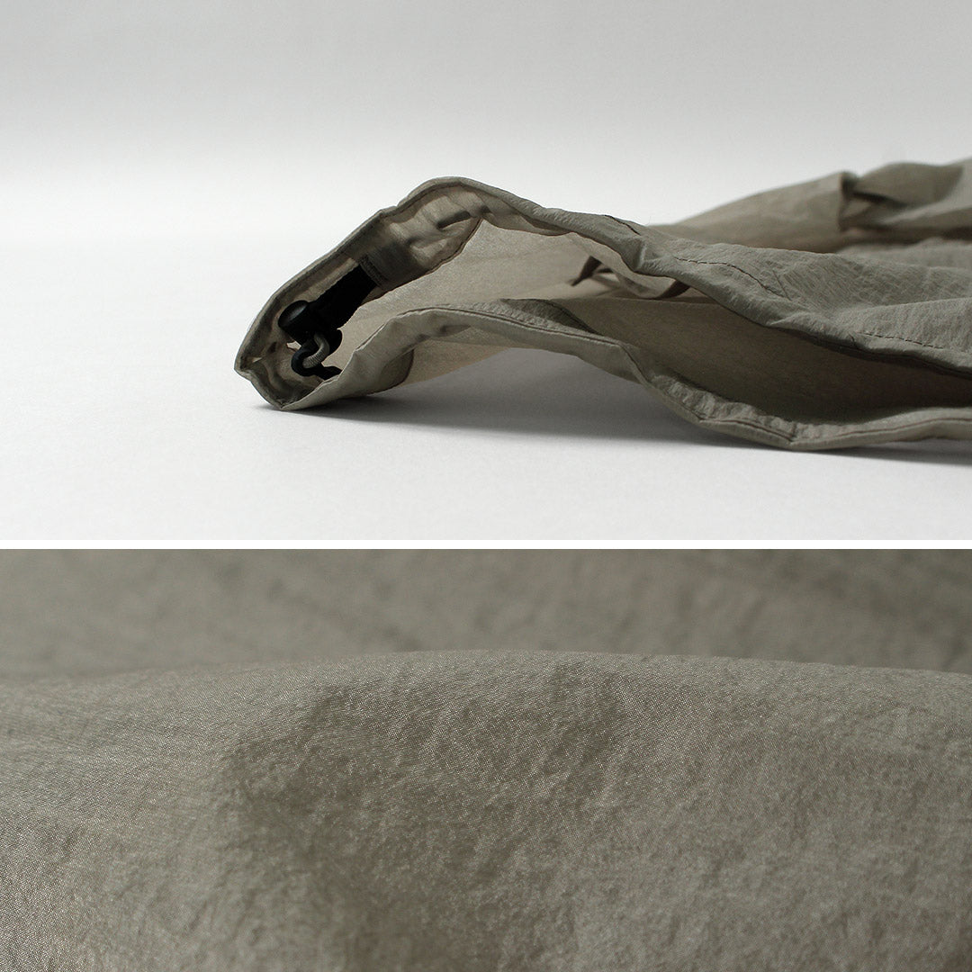 GOLDWIN / Veste coupe-vent en nylon transparent