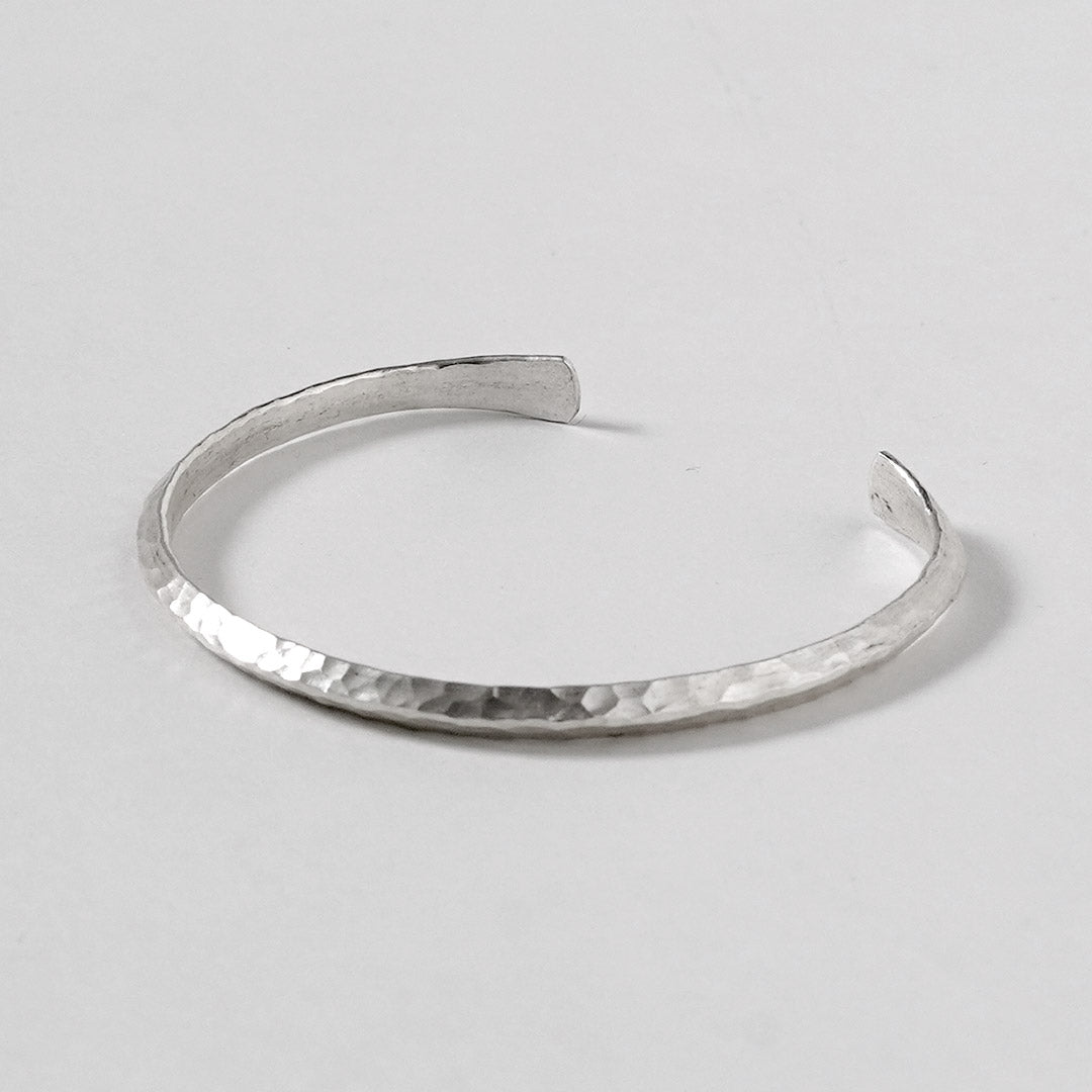 phaduA / Karen Silver Hammered Center Accent Bangle